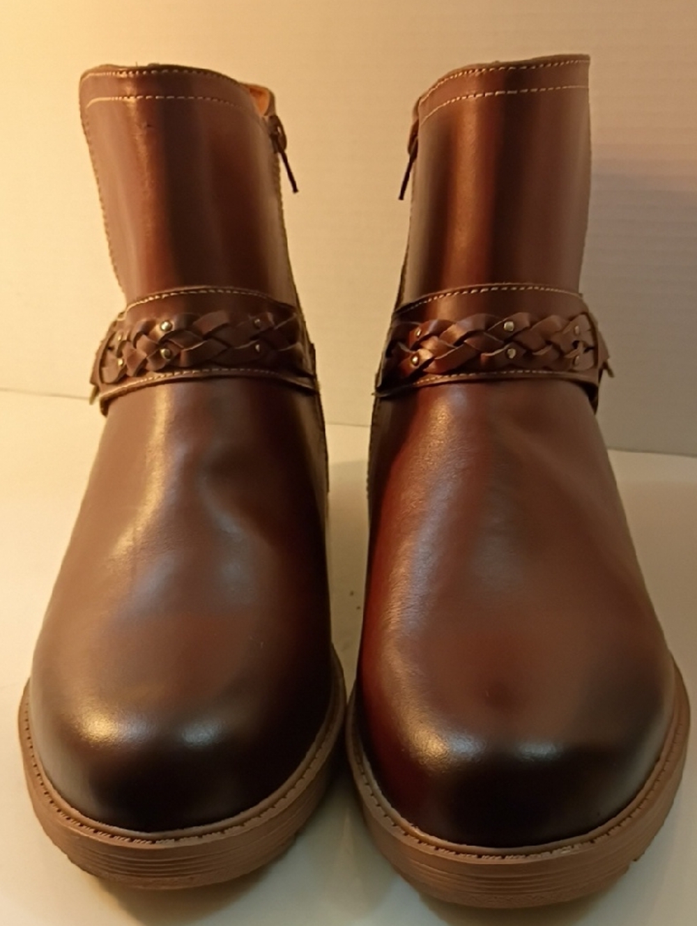 Clarks Hearth Kaylie Women's Boots featuring a braided strap detail.